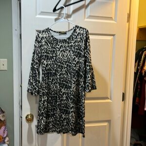 Women’s very nice 3/4 sleeve dress. Leopard print. Microfiber I believe.